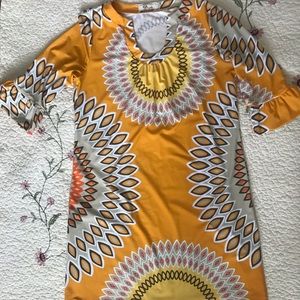 Tunic. 80% nylon 20% spandex.